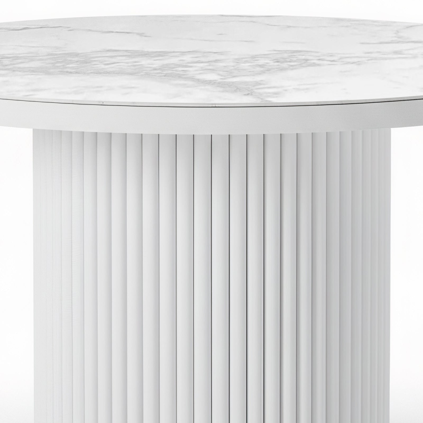 Evone Aluminium Outdoor Dining Table in White features a round, marble-look top with grey veining, supported by a cylindrical base with vertical grooves, offering stylish durability for outdoor dining.