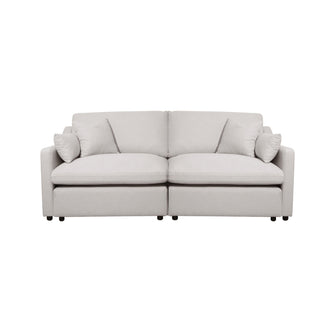 Modern light beige sofa isolated on a white background, full front view