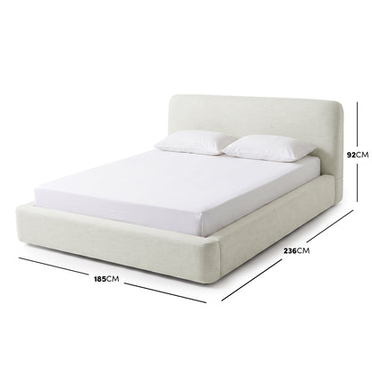 Upholstered bed on a white background with dimensions labeled in centimeters