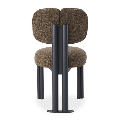 Norii Boucle Fabric Dining Chair in Rust Brown, featuring a curved split-backrest, textured bouclé upholstery, and black-powder-coated steel frame with sleek, sculptural design.