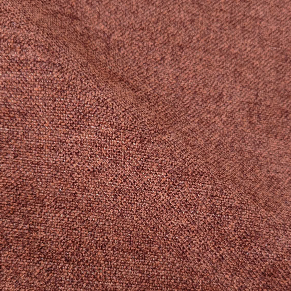 Close-up of reddish-brown fabric texture