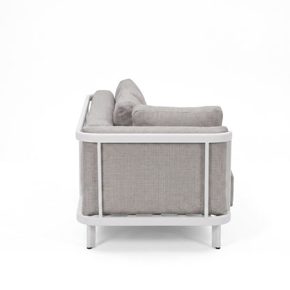 Side view of a modern light gray sofa with a white frame on a white background.