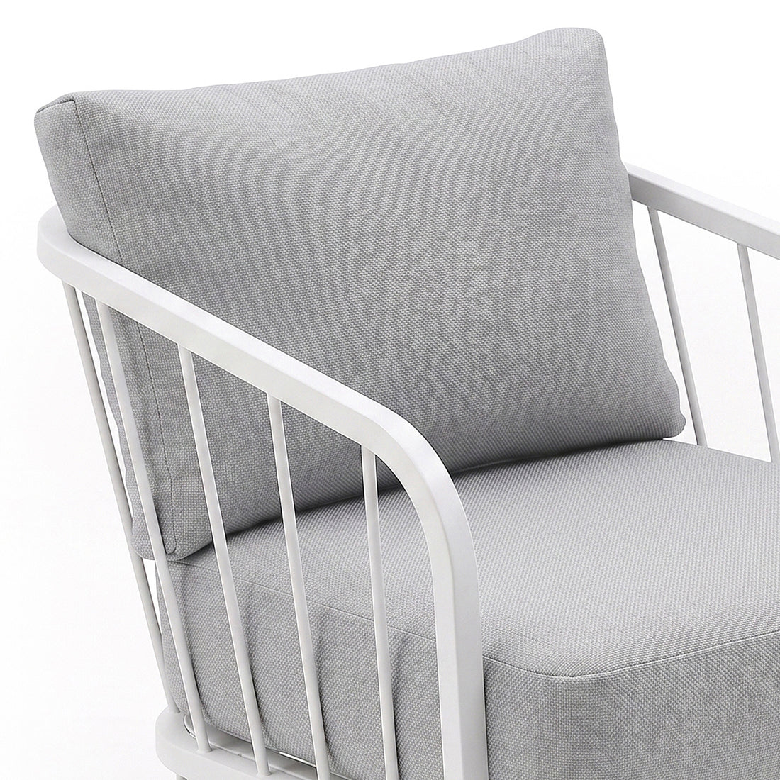 Close-up of a chair seat and back with white metal frame on a white background