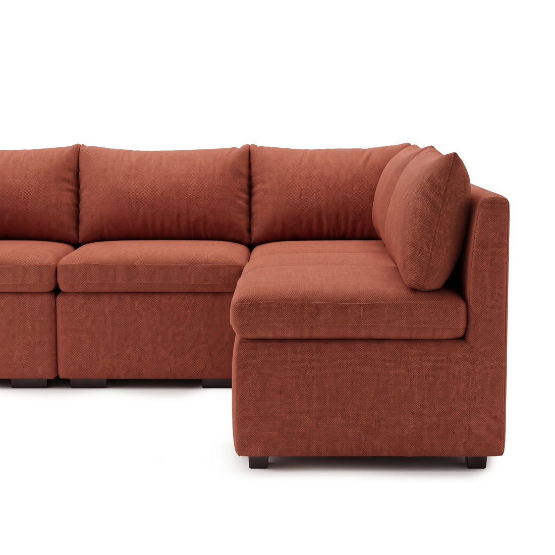Nearly full terracotta sectional sofa with chaise on a white background