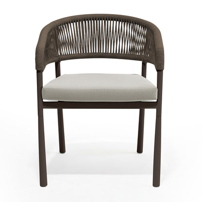 Coastal Outdoor Rope Dining Chairs Set of 2 in Brown, featuring a modern design with a metal frame, woven-rope wraparound back and arms, and light-colored seat cushions, ideal for outdoor dining.