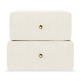 Luxo Tyla Modern Velvet Bedside Table Beige features two stacked off-white velvet drawer modules, each with a central brass knob, showcasing a plush, compact design perfect for enhancing bedroom elegance.