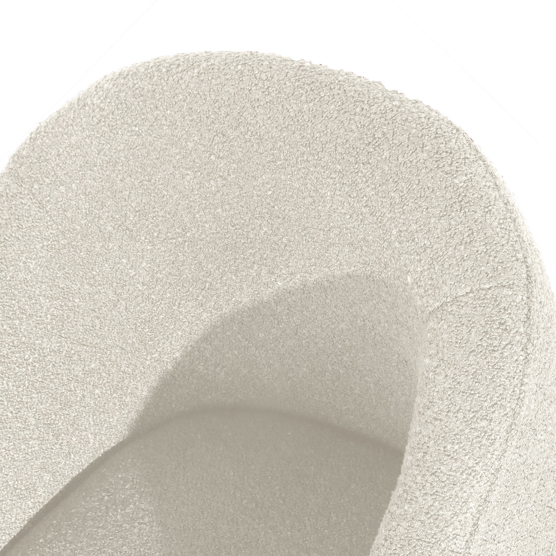 Close-up of the Nuve Bouclé Upholstered Accent Armchair in Cream White, highlighting its curved, porous foam texture and gentle folds, embodying comfort and modern design.