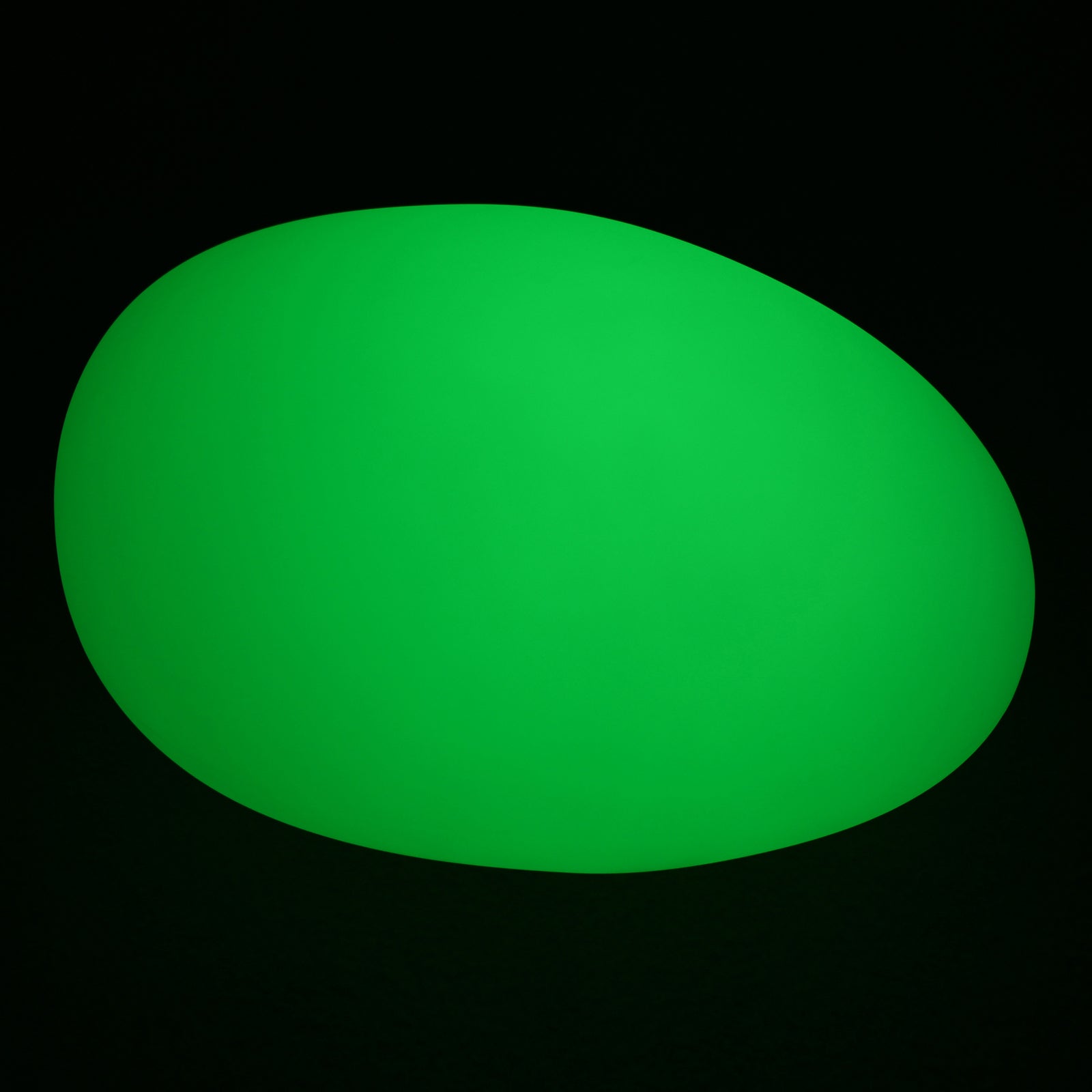 Solar Charging Outdoor LED Rock Light Waterproof Stone Lamp depicted as a smooth green oval on a black background, resembling a natural stone, designed for seamless integration into garden landscapes.