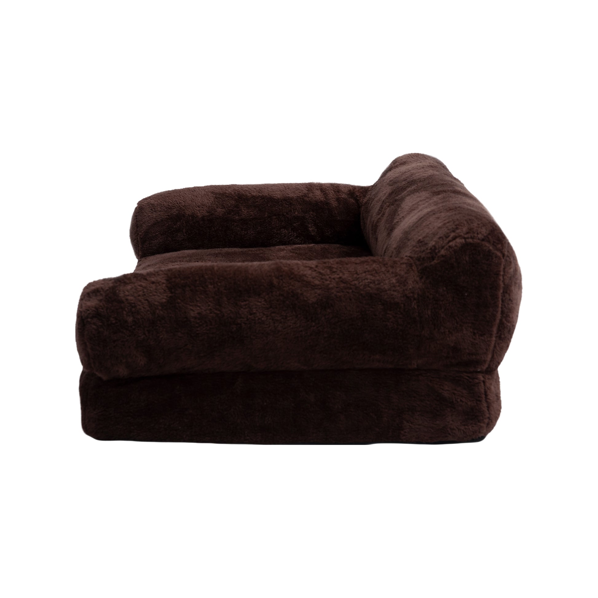Side profile of dark brown plush furniture on white background