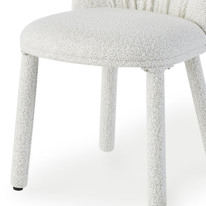 Joren Boucle Arched Dining Chair Set of 2 in Cream, featuring a round padded seat, matching curved backrest, and textured bouclé fabric on cylindrical legs, offering stylish comfort.