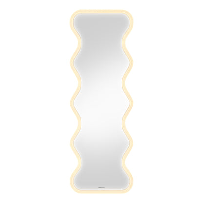Contemporary wavy-edge LED mirror on white background