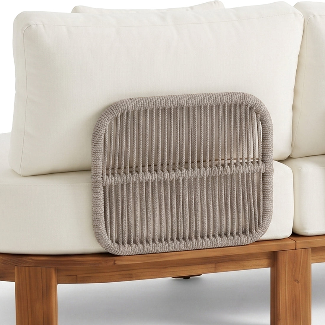 Close-up of a woven furniture detail on a cushioned seat in a real-life setting.