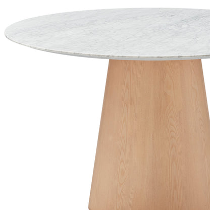 Dina 120cm Round Marble Dining Table in Carrara Natural features a sleek marble-look top on a light wood conical pedestal, combining elegance and functionality for a refined dining experience.