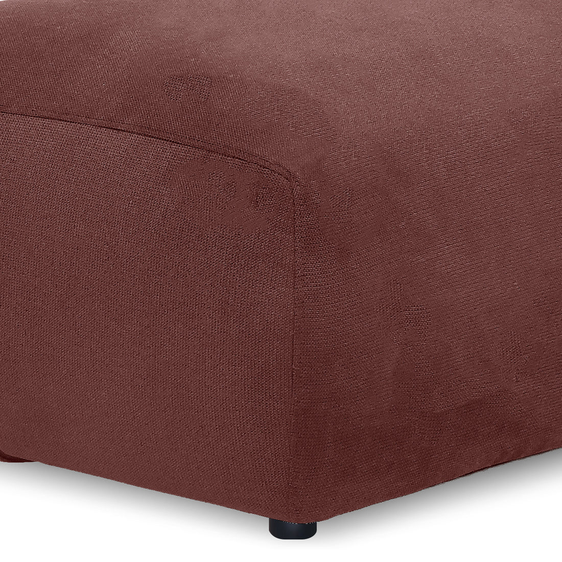 Detail shot of ottoman corner and fabric texture on white background