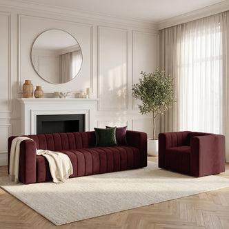 Dark Merlot sofa and armchair styled in a modern living room