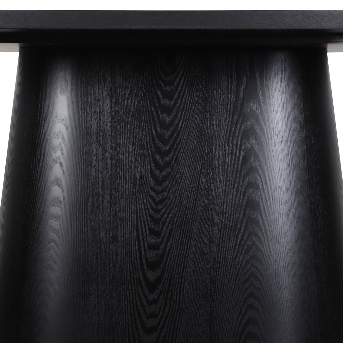 Close-up of the Gigi 180cm Oval Wooden Dining Table in Black, showcasing the tapered, conical pedestal leg with visible wood grain and light reflections, emphasizing its refined timber appearance.