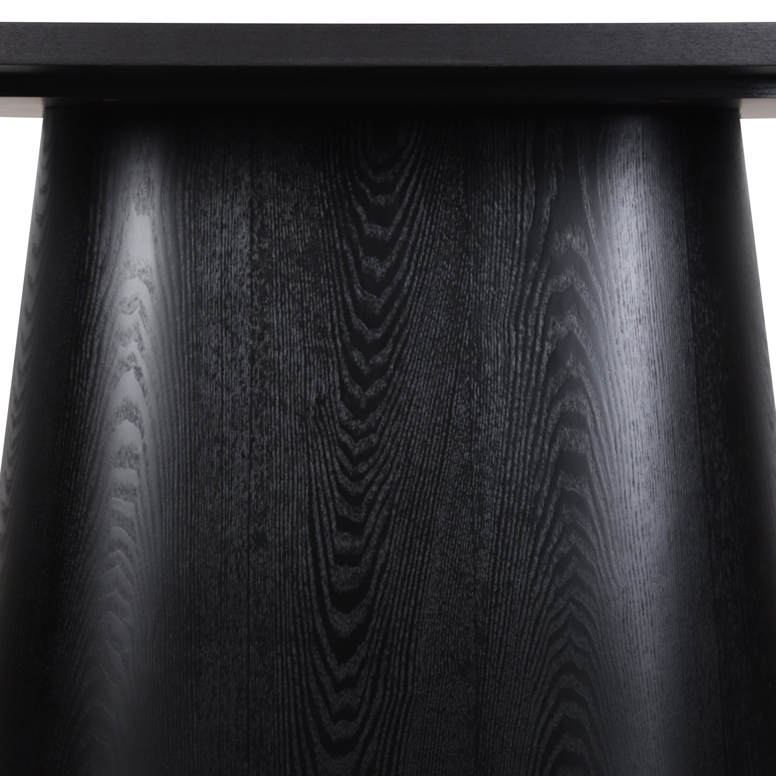 Close-up of the Gigi 180cm Oval Wooden Dining Table in Black, showcasing the tapered, conical pedestal leg with visible wood grain and light reflections, emphasizing its refined timber appearance.