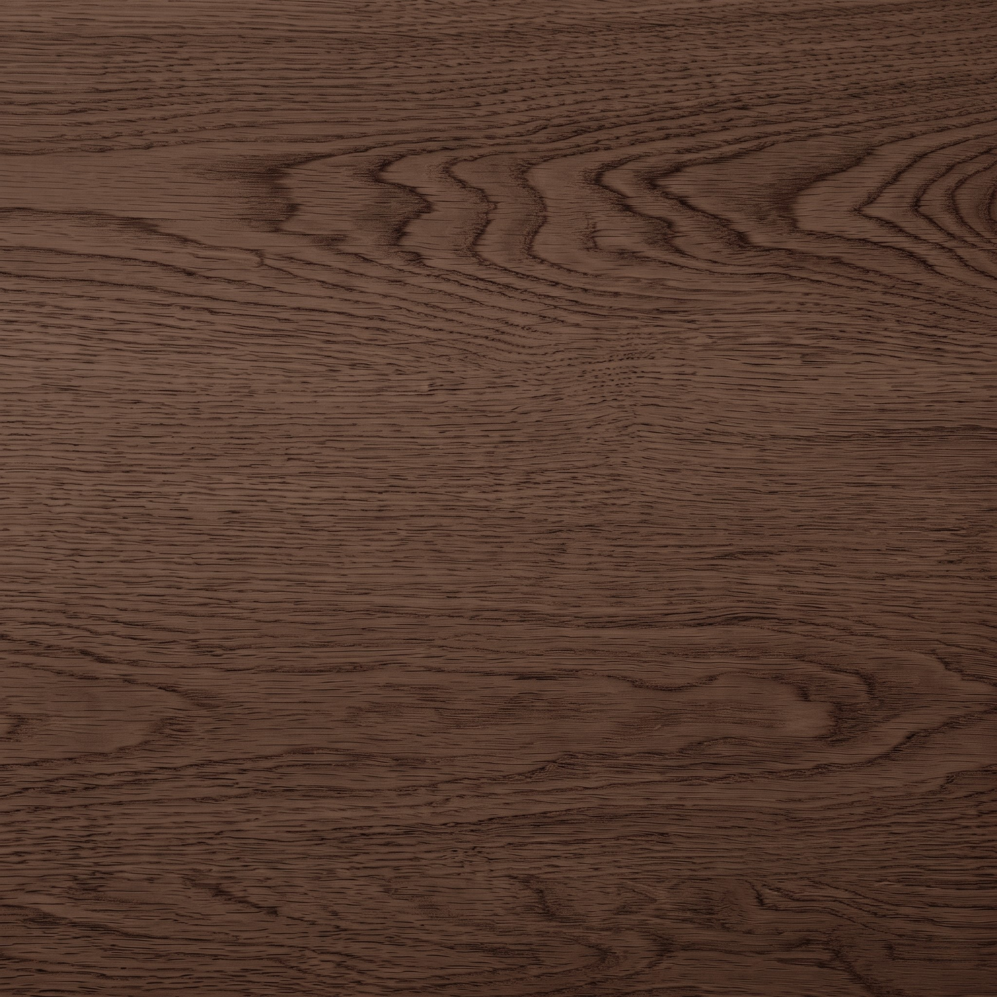 Close-up of dark wood grain texture.