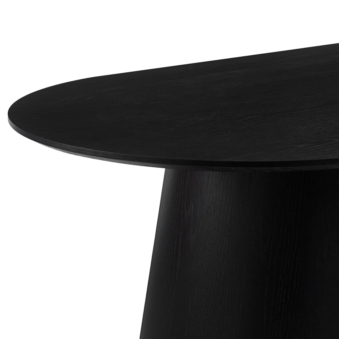 Close-up partial view of a black table top and leg on a white background