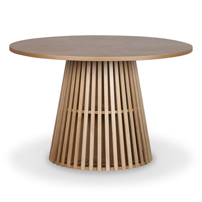Riri 120cm Round Fluted Wood Dining Table features a smooth circular top and a sculptural conical base of vertical slats, creating a modern, airy look ideal for compact dining spaces.