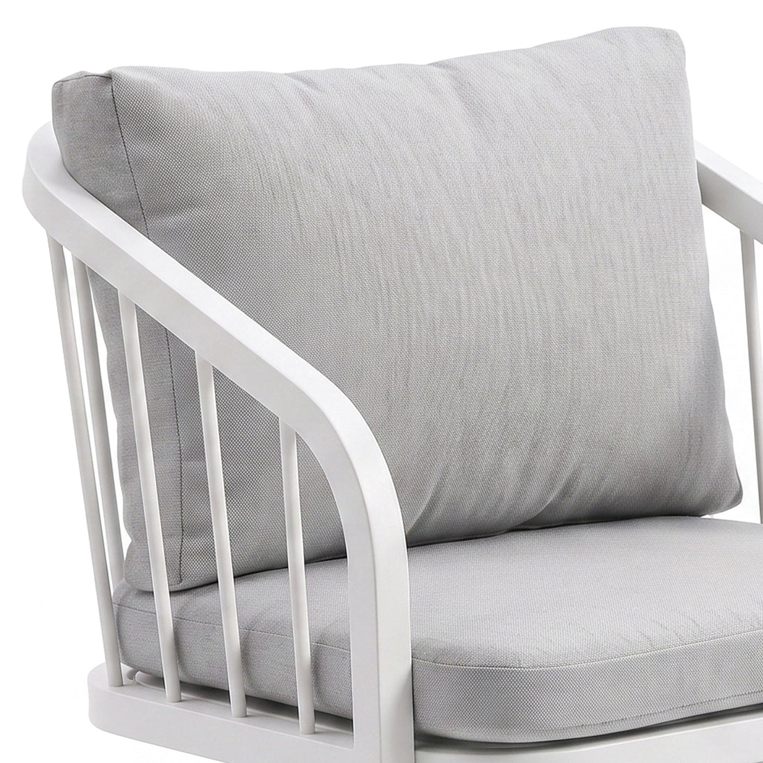Upper half of cushioned chair on white background