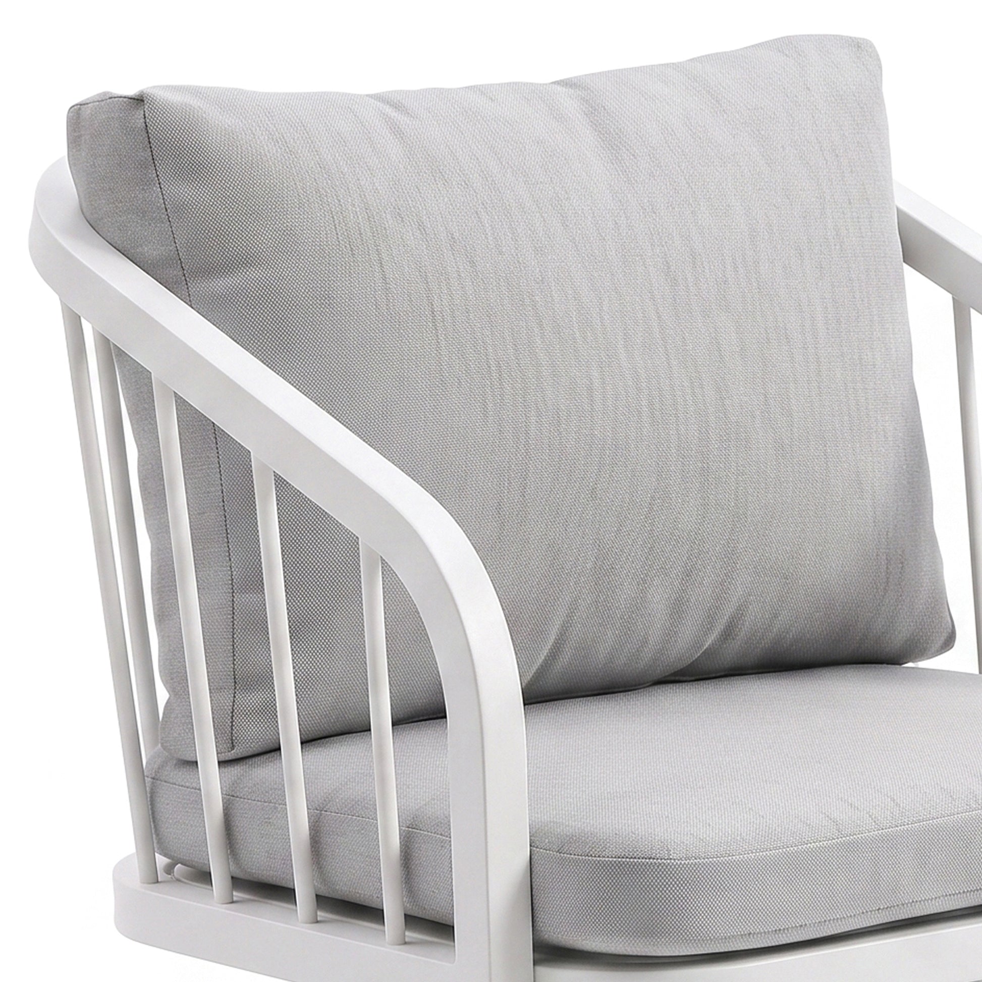 Upper half of cushioned chair on white background