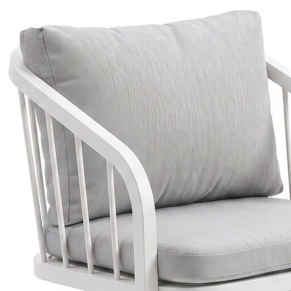 Upper half of cushioned chair on white background