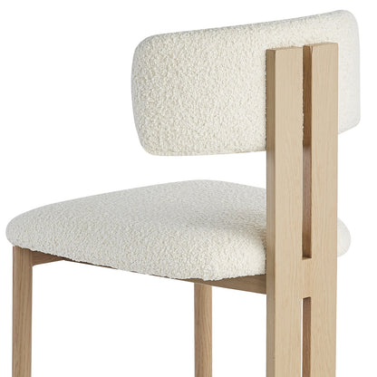 Haleo Curved Boucle Fabric Barstool Set of 2 in Cream White, featuring a minimalist design with light wood-look metal legs, a tall arched backrest, and off-white boucle upholstery for comfort and style.