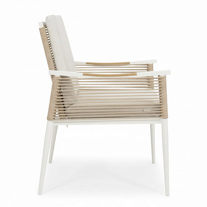 Casara 7 Piece Outdoor Dining Set in White & Beige features a modern lounge chair with a slim metal frame, synthetic-rope cords, and padded cushions, ideal for minimalist patio or sunroom seating.