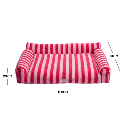Pink striped pet bed on white background with dimension lines marking 25 cm, 81 cm, and 110 cm