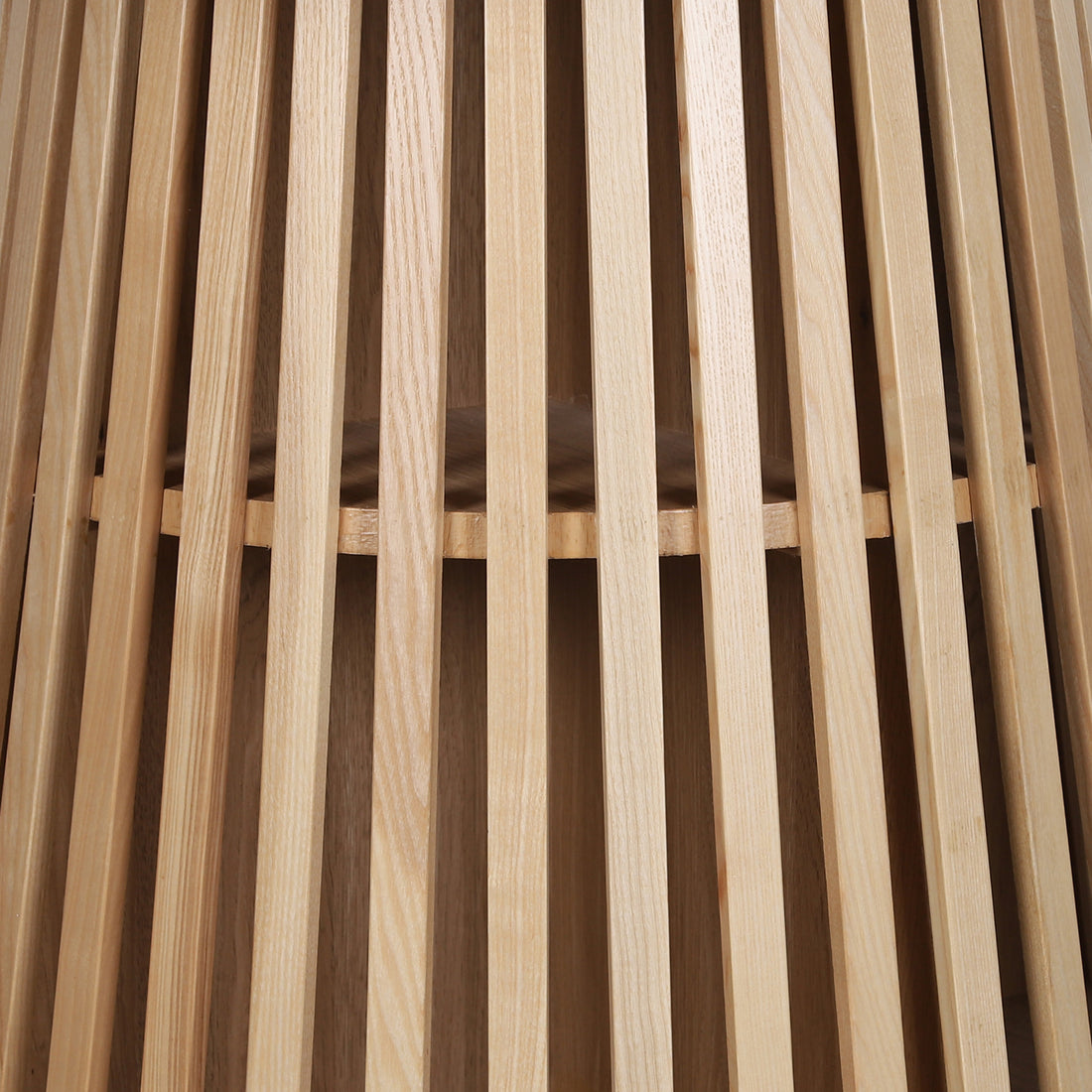 Close-up of the Riri 120cm Round Fluted Wood Dining Table in Oak, showcasing its vertical wooden slats forming the sculptural fluted cone base, highlighting its architectural elegance and modern design.