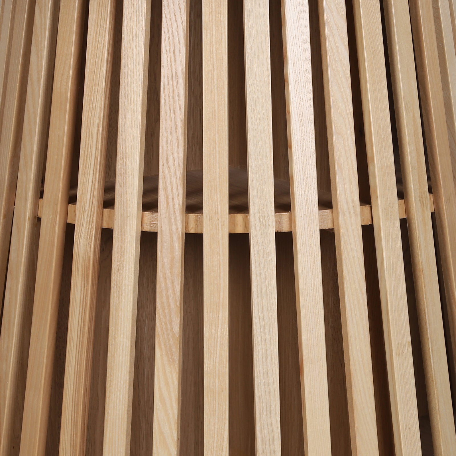 Close-up of the Riri 120cm Round Fluted Wood Dining Table in Oak, showcasing its vertical wooden slats forming the sculptural fluted cone base, highlighting its architectural elegance and modern design.