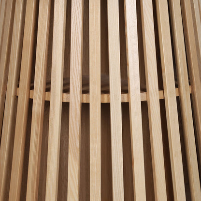 Close-up of the Riri 120cm Round Fluted Wood Dining Table in Oak, showcasing its vertical wooden slats forming the sculptural fluted cone base, highlighting its architectural elegance and modern design.