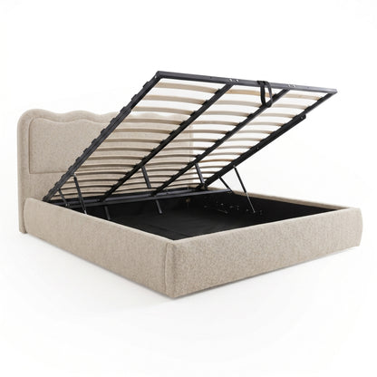 Upholstered bed with lift storage mechanism on white background