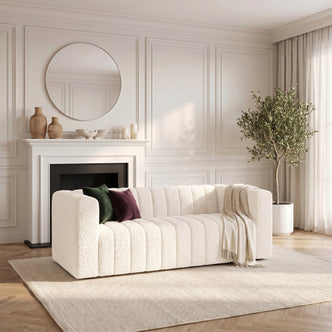 Cream sofa styled in a modern living room