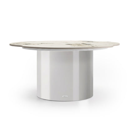 Round coffee table with metallic cylindrical base and light marble-effect top on a white background