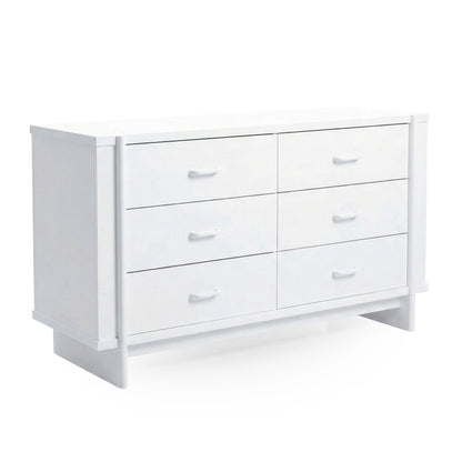 White six-drawer dresser on white background viewed at an angle
