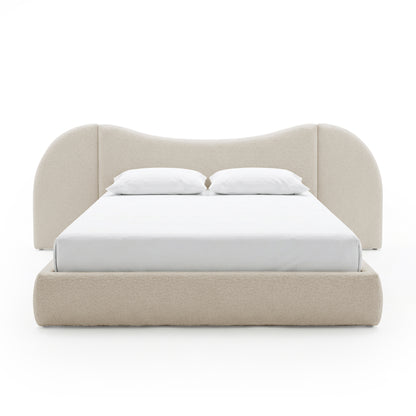 Front view of upholstered bed on white background