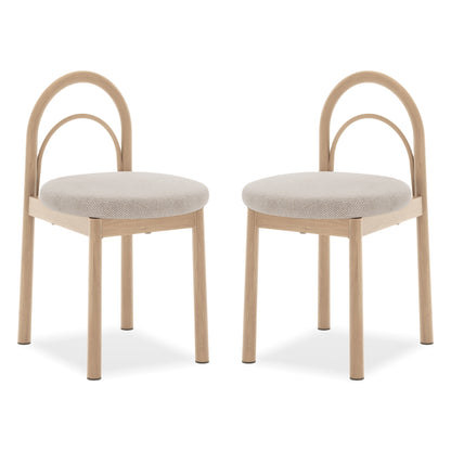 Two modern chairs with arched backs on a white background.