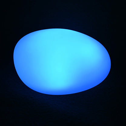 Solar Outdoor LED Rock Light Waterproof Garden Lamp, a pebble-shaped, blue-lit decorative lamp, ideal for gardens. It mimics natural stone, providing ambient lighting without cables, enhancing outdoor spaces effortlessly.