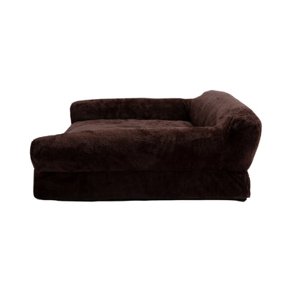 Side view of brown bolster dog bed on white background