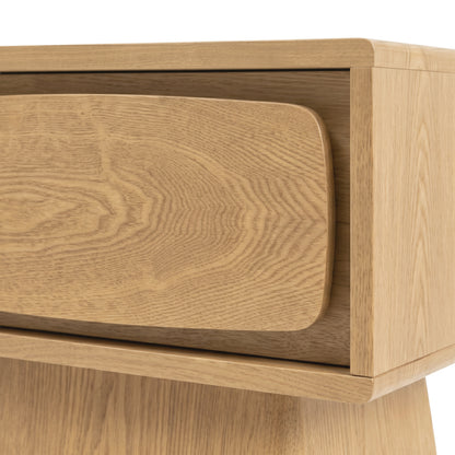 Close-up detail of the corner of a wooden furniture piece