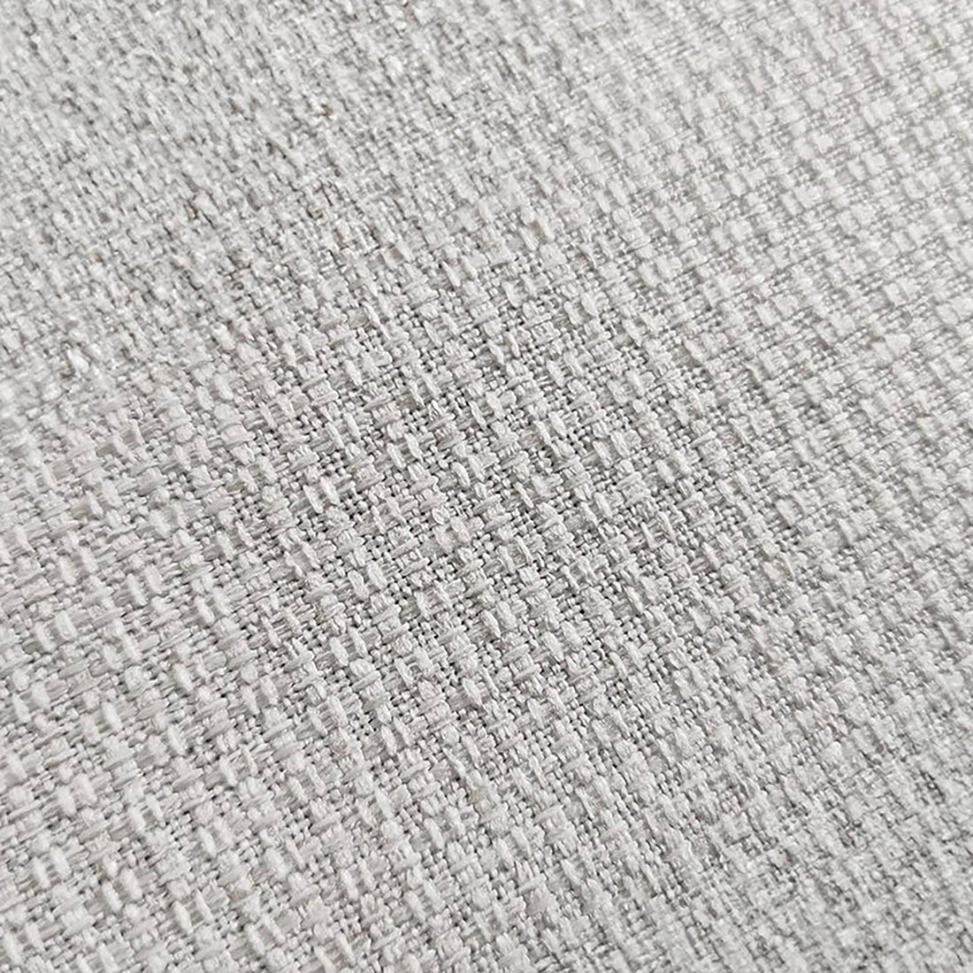 Close-up of light gray woven fabric texture.