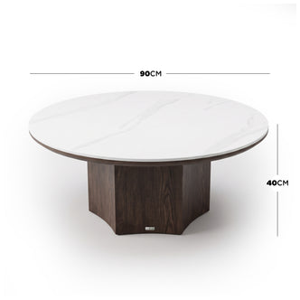Round table with white marble-look top and dark wooden base shown on a white background with dimensions 90 cm by 40 cm.