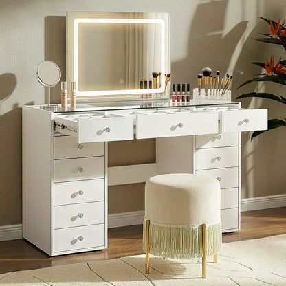 White vanity table in a cozy room with stool, mirror, and makeup accessories