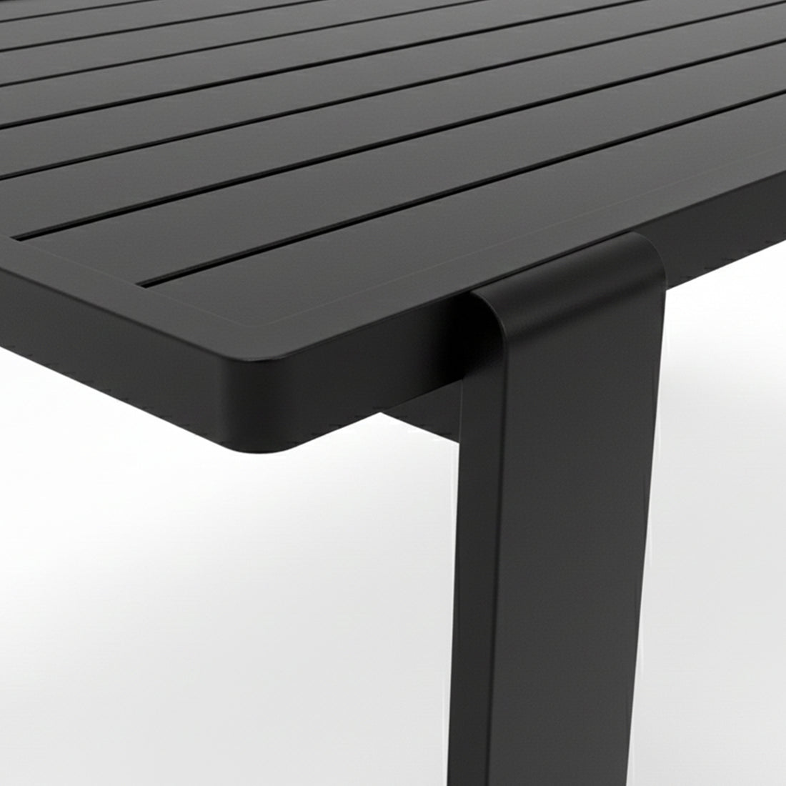 Close-up of the Positano 6 Seater Outdoor Dining Set's black slatted tabletop corner, showcasing the sleek bent metal leg, emphasizing its modern outdoor design.