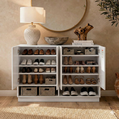 White storage cabinet in a cozy room with open doors revealing shelves with baskets and shoes
