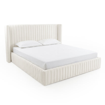 Ivory upholstered platform bed with vertically channeled headboard and footboard on a white background