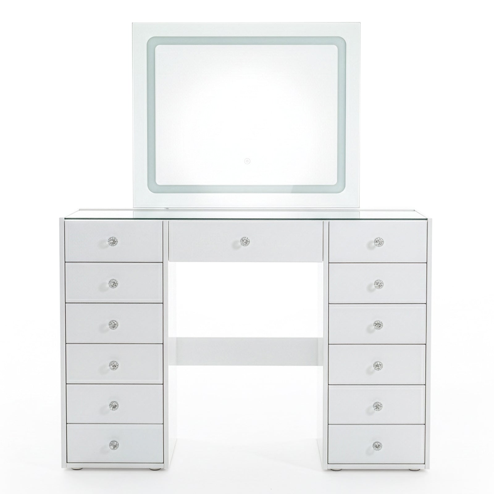 White vanity table with attached square mirror and crystal drawer knobs on white background