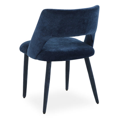 Dark blue upholstered chair rear angle on white background